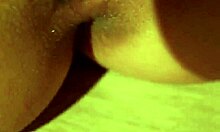 Young cutie with long nails sensually fingers her shaved pussy