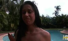 Brunette Babe Gets Oiled Up for Outdoor Relaxation