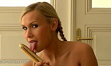 Pigtailed blonde slut fucks herself with dildo