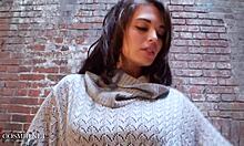 Shy brunette cutie teases by peeling off her outfit slowly