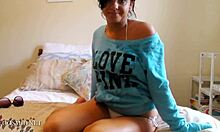 seductive young 18+ hottie strips on bed