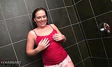 Chubby brunette flaunts her big ass in steamy shower