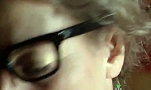 nerdy young girl in glasses fingers herself while moaning softly at home