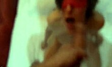 masked girl getting a full body treatment on cam