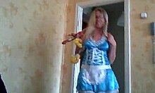 Girlfriend in blue dress and stockings gives detailed blowjob sucking cock