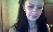 desirable sweetie dancing in miniskirt, showing body on webcam