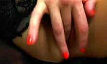 This brunette camwhore in lingerie is fingering herself hard to earn money