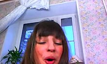 lusty young babe dances naked by window, teasing on webcam in homemade seduction.