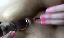 teen brunette says, watch me use this toy while masturbating close up