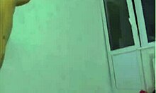 Oiled teen camwhore teases with dripping candle wax on skin