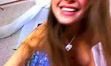 lusty young babe dances naked by window, teasing on webcam in homemade seduction.