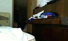 cute brunette teases with striptease on webcam