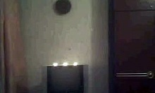 desirable sweetie dancing in miniskirt, showing body on webcam