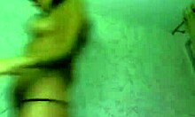 cute brunette teases with striptease on webcam