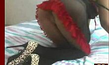 A slutty brunette in a see-thru dress plays dirty on webcam