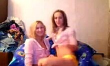 Two cute lesbian friends tease each other on webcam show.