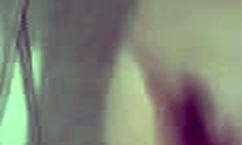 Buxom brunette girlfriend showers wet in homemade video.