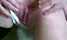 cutie in stockings fingering herself at home