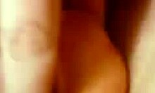 Aroused girlfriend spreads shaved pussy for close-up dildo masturbation in homemade clip.