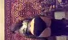 Pretty Russian babe dances seductively in stockings, nylon lingerie, and panties, teasing with her mature fetish moves