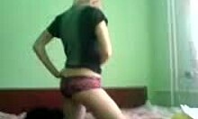 Amateur Blonde Hottie Teasingly Puts On Her Sexy Clothes In Private Bedroom