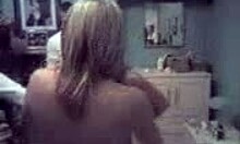 The naughty Russian cutie strips and shows her ass to her best friends on the bed.