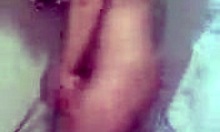 Buxom brunette girlfriend showers wet in homemade video.