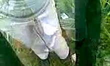 Girlfriend sucks boyfriend's thick dick outdoors in nature