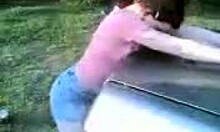 I'm an amatuer redhead posin on the car in my miniskirt, teasin outdoors.