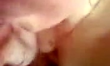 glamorous mature wife enjoys intimate moment with husband