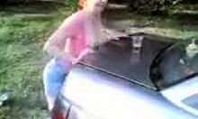 I'm an amatuer redhead posin on the car in my miniskirt, teasin outdoors.