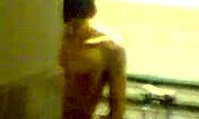 Amateur brunette couple fucks hard in public toilet doggystyle