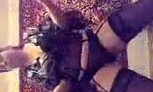 Pretty Russian babe dances seductively in stockings, nylon lingerie, and panties, teasing with her mature fetish moves