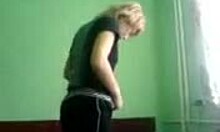 Amateur Blonde Hottie Teasingly Puts On Her Sexy Clothes In Private Bedroom