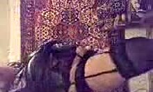 Pretty Russian babe dances seductively in stockings, nylon lingerie, and panties, teasing with her mature fetish moves