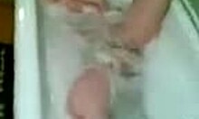 Buxom blonde diva bathes and sucks cock in bathroom