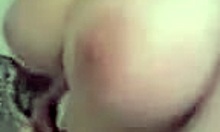 Buxom brunette girlfriend showers wet in homemade video.