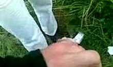 Girlfriend sucks boyfriend's thick dick outdoors in nature