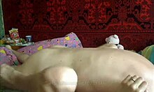 Naked teen couple switches positions while banging hard on their cozy bed.