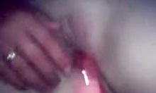 boyfriend helps his naked girl reach climax with dildo fingering