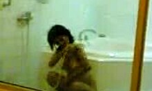 Yo, cute young Asian filmed taking a steamy shower in private bathroom