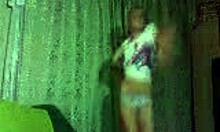 This petite blonde is dancing and teasing to the music