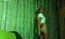 This petite blonde is dancing and teasing to the music