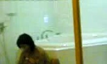 Yo, cute young Asian filmed taking a steamy shower in private bathroom