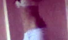 Petite young slut strips and dances on her bed