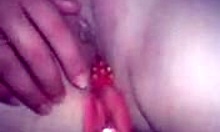 boyfriend helps his naked girl reach climax with dildo fingering