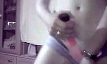 Two lesbians feel intense passion groping and teasing with dildo on cam