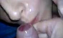 My short-haired brunette girlfriend sucking my cock in close-up