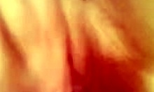 horny camgirl flaunts wet pussy in close-up during solo play