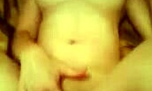 horny camgirl flaunts wet pussy in close-up during solo play